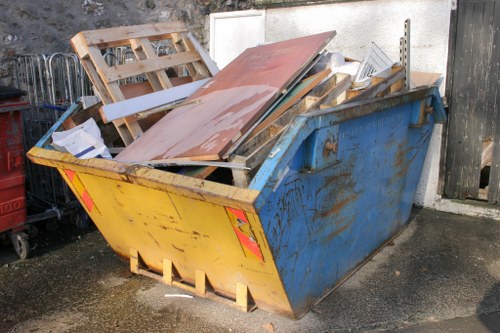 Rubbish collection truck servicing a neighborhood